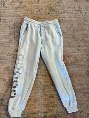 Over time, Light Blue Sweatpants with Side Logo